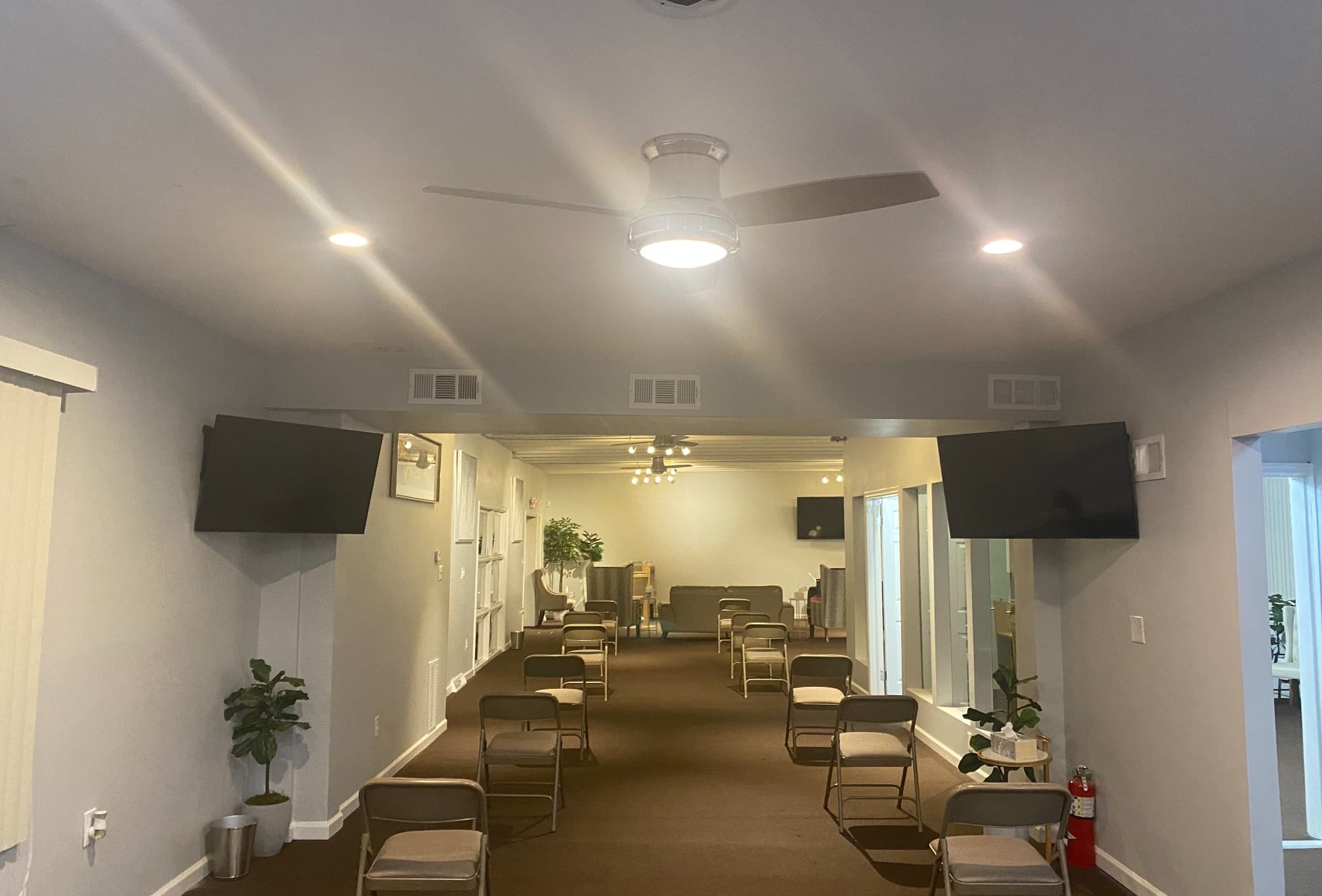 Funeral home chapel with integrated display and technology systems